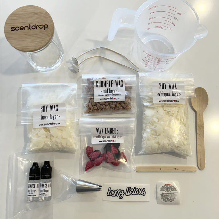 Wax supplies including bags of wax layers and embeds on a white surface with 'scentdrop' branding.