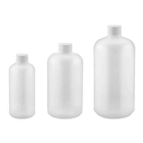 Three white bottles of different sizes on a white background
