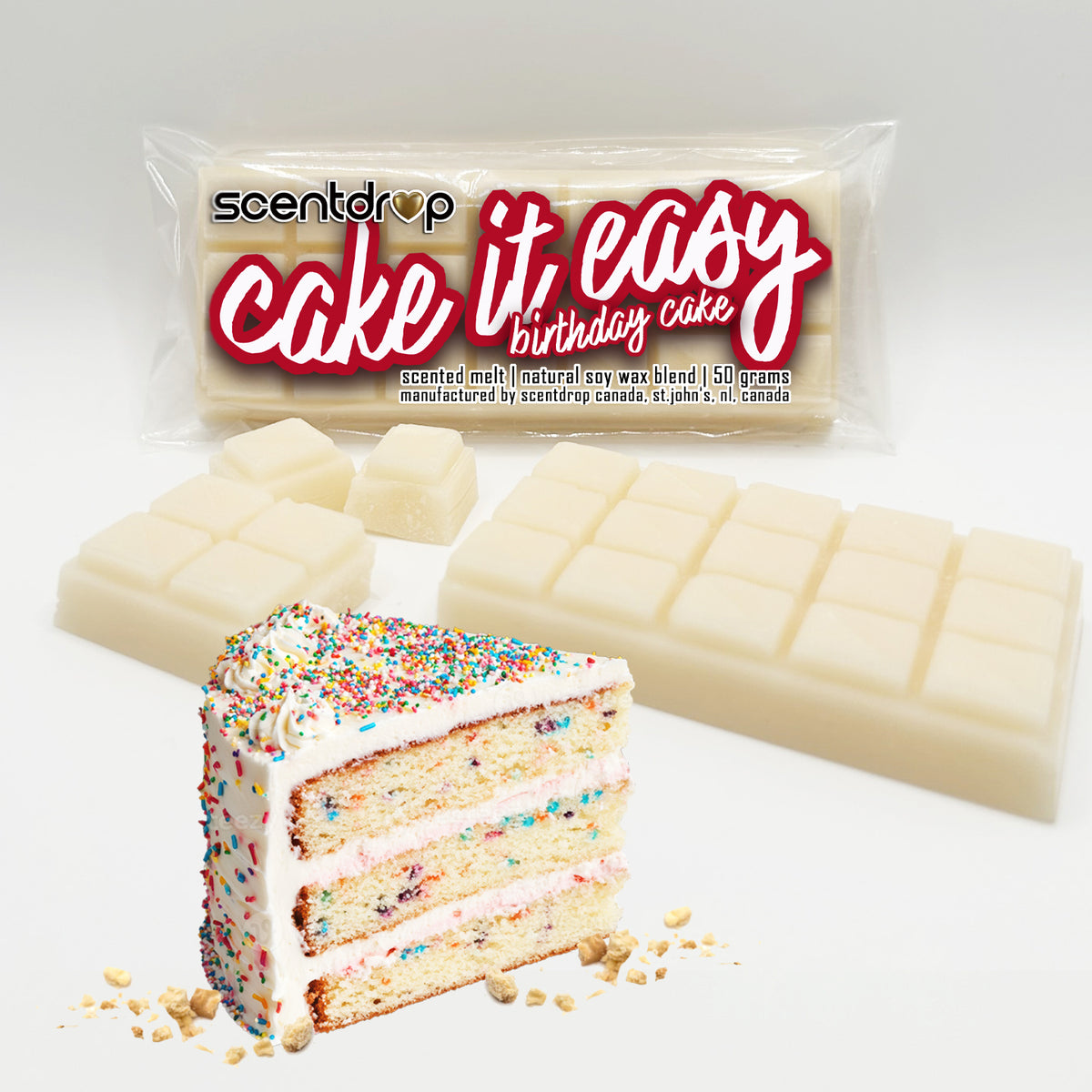 Scentdrop 'Cake It, Easy Birthday Cake' scented wax melt packaging shown with several off-white wax melts shaped like chocolate bars and a slice of layered cake with rainbow sprinkles in front, on a clean white background.