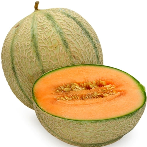 Whole and halved cantaloupe on a white background