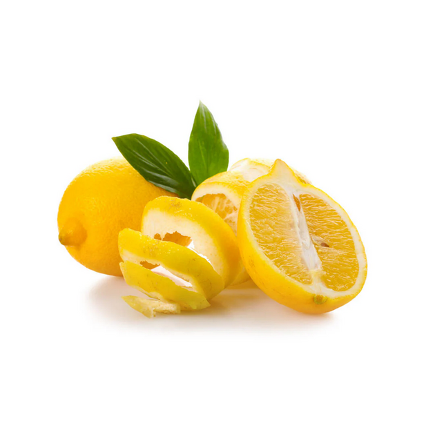 Sliced lemons with a whole lemon and leaves on a white background
