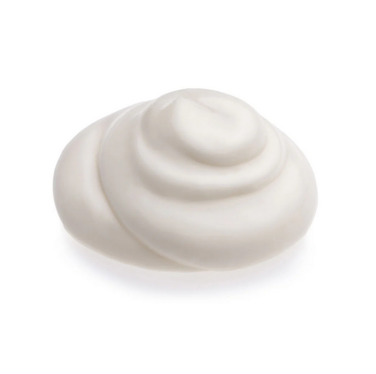 White whipped cream swirl on a white background
