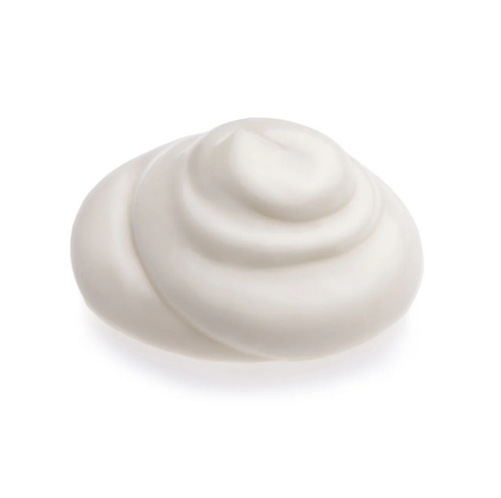 White whipped cream swirl on a white background