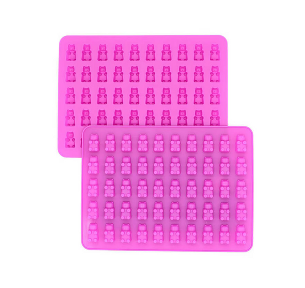 Two pink silicone molds with bear shapes on a white background.