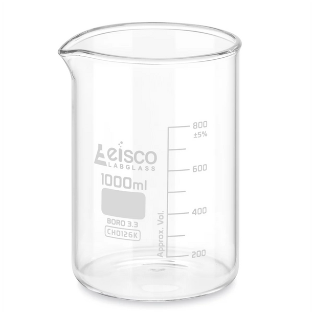 Clear glass beaker with measurement markings on a white background