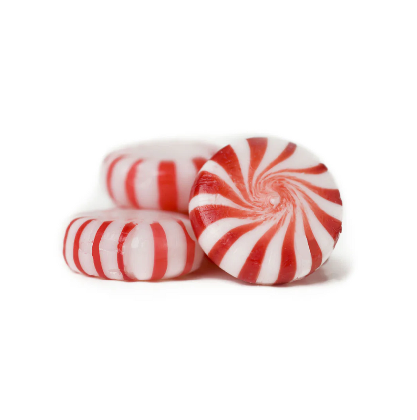 Red and white striped candy on a white background