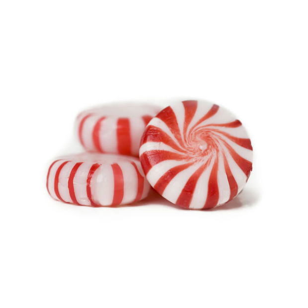 Red and white striped candy on a white background