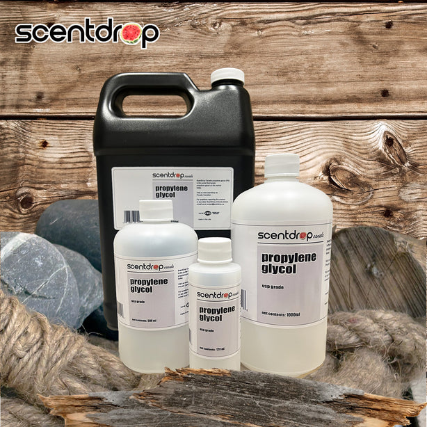 Collection of Scentdrop propylene glycol bottles on a wooden surface